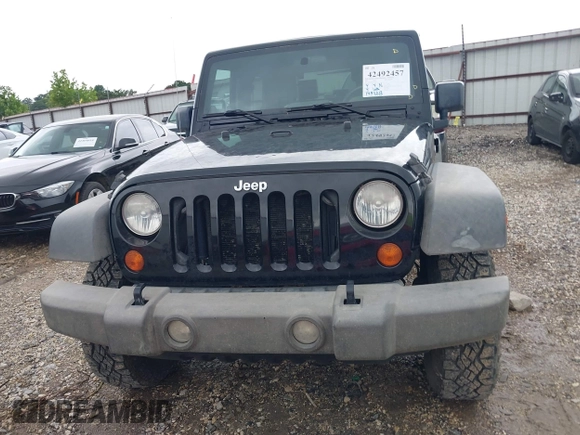 2007 Jeep Wrangler X with VIN 1J4FA24187L179428, listed as a IAAI auction lot 42492457 with 148,208 mi miles and . Bid and sale history available at DreamBid. Image 12.
