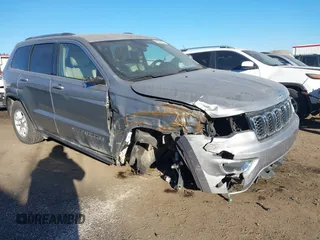 2018 Jeep Grand Cherokee Laredo E with VIN 1C4RJEAG9JC126080, listed as a IAAI auction lot 41355941 with 108,919 mi miles and . Bid and sale history available at DreamBid. Image 1.