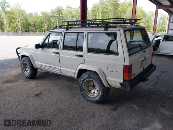 1996 Jeep Cherokee Sport with VIN 1J4FJ68S5TL259449, listed as a IAAI auction lot 42376697 with 72,835 mi miles and . Bid and sale history available at DreamBid. Image 3.