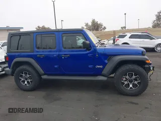 2018 Jeep Wrangler Unlimited Sport S with VIN 1C4HJXDG7JW235946, listed as a IAAI auction lot 42473146 with 37,973 mi miles and . Bid and sale history available at DreamBid. Image 14.