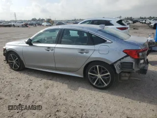 2023 Honda Civic Touring z VIN 2HGFE1F92PH323562, wystawiony jako Copart lot #54060205 z przebiegiem 20 504 mil mil oraz Czysty tytuł • Clean title. Historia ofert i sprzedaży dostępna na DreamBid. Obrazek 2.