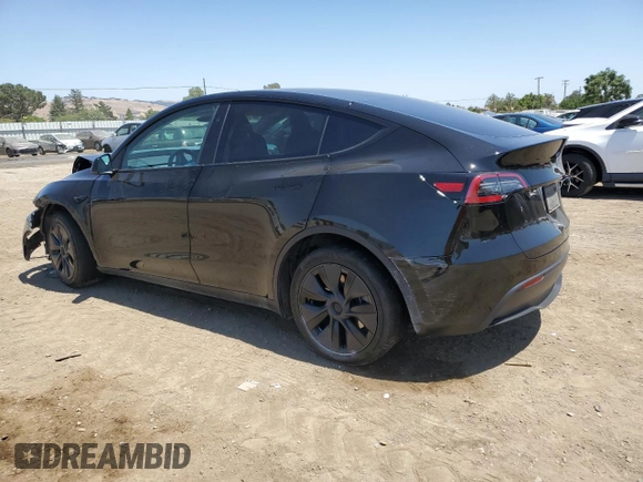 2024 Tesla Model Y Long Range with VIN 7SAYGAEE9RF125458, listed as a Copart auction lot 59567365 with 28,966 mi miles and Salvage title. Bid and sale history available at DreamBid. Image 2.