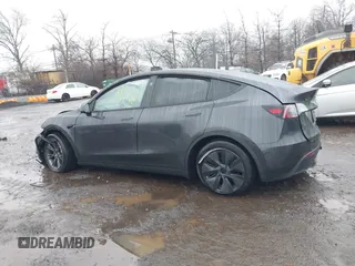 2025 Tesla Model Y Long Range with VIN 7SAYGDED6SF226035, listed as a IAAI auction lot 41102115 with Not Provided miles and . Bid and sale history available at DreamBid. Image 14.