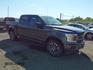 2018 Ford F-150 XL z VIN 1FTEW1EP2JKE85022, wystawiony jako IAAI lot #42650839 z przebiegiem 169 966 mil mil oraz . Historia ofert i sprzedaży dostępna na DreamBid. Obrazek 1.