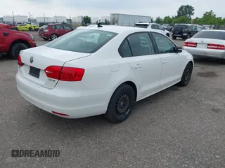 2011 Volkswagen Jetta SE with VIN 3VWDZ7AJ9BM323337, listed as a IAAI auction lot 42439854 with 167,275 mi miles and . Bid and sale history available at DreamBid. Image 4.
