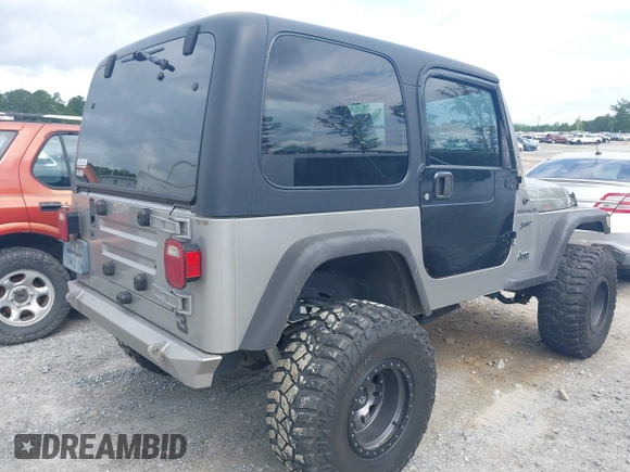 2002 Jeep Wrangler Sport with VIN 1J4FA49S52P717811, listed as a IAAI auction lot 42449753 with 252,258 mi miles and . Bid and sale history available at DreamBid. Image 4.
