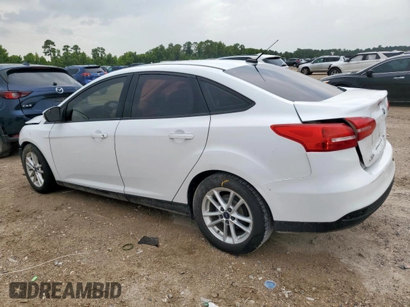 2016 Ford Focus SE with VIN 1FADP3F29GL259317, listed as a Copart auction lot 62646685 with 100,523 mi miles and Salvage title. Bid and sale history available at DreamBid. Image 2.