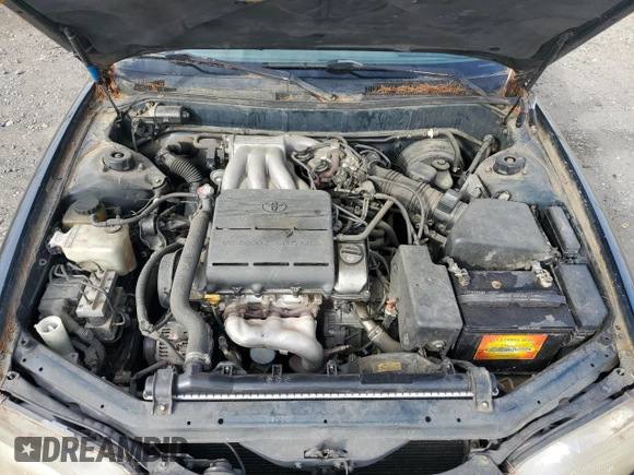 1995 Toyota Camry LE z VIN 4T1GK12W4SU079938, wystawiony jako Copart lot #77065084 z przebiegiem 222 731 mil mil oraz Szkoda całkowita • Salvage title. Historia ofert i sprzedaży dostępna na DreamBid. Obrazek 11.