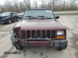 2000 Jeep Cherokee z VIN 1J4FF48S0YL254270, wystawiony jako Copart lot #52589415 z przebiegiem 166 860 mil mil oraz Szkoda całkowita • Salvage title. Historia ofert i sprzedaży dostępna na DreamBid. Obrazek 5.
