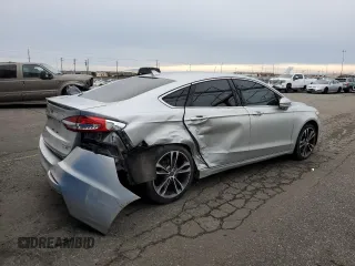 2019 Ford Fusion Titanium with VIN 3FA6P0D90KR187859, listed as a Copart auction lot 88341915 with 93,518 mi miles and Salvage Title. Bid and sale history available at carsss.com. Image 3.