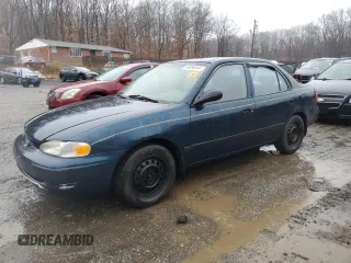 2000 Chevrolet Prizm z VIN 1Y1SK528XYZ418233, wystawiony jako Copart lot #83036344 z przebiegiem Nie podano mil oraz Szkody całkowita. Historia ofert i sprzedaży dostępna na DreamBid. Obrazek 1.