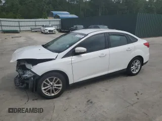 2015 Ford Focus SE with VIN 1FADP3F21FL246821, listed as a Copart auction lot 59732635 with 135,752 mi miles and Salvage title. Bid and sale history available at DreamBid. Image 1.