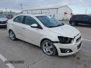 2014 Chevrolet Sonic LTZ with VIN 1G1JE5SH3E4133088, listed as a IAAI auction lot 41072056 with 143,855 mi miles. Bid and sale history available at carsss.com. Image 1.