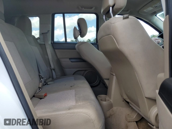 2014 Jeep Compass Sport with VIN 1C4NJCBA5ED844934, listed as a Copart auction lot 52774945 with 148,897 mi miles and Salvage Title. Bid and sale history available at carsss.com. Image 10.