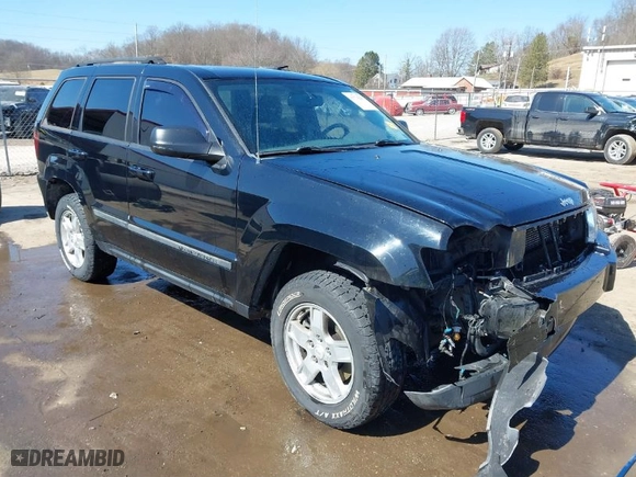 2007 Jeep Grand Cherokee Laredo with VIN 1J8GR48K67C523705, listed as a IAAI auction lot 41774281 with 215,572 mi miles. Bid and sale history available at carsss.com. Image 1.