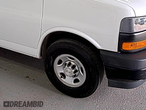 2021 Chevrolet Express Cargo z VIN 1GCWGAFP5M1201537, wystawiony jako IAAI lot #42642579 z przebiegiem 96 732 mil mil oraz . Historia ofert i sprzedaży dostępna na DreamBid. Obrazek 19.