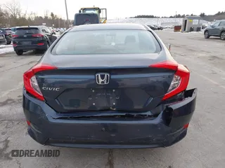 2017 Honda Civic LX z VIN 19XFC2F52HE028823, wystawiony jako IAAI lot #41312009 z przebiegiem 56 462 mil mil oraz . Historia ofert i sprzedaży dostępna na DreamBid. Obrazek 16.