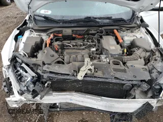 2022 Honda Insight Touring z VIN 19XZE4F98NE007587, wystawiony jako Copart lot #55233995 z przebiegiem 71 450 mil mil oraz Szkoda całkowita • Salvage title. Historia ofert i sprzedaży dostępna na DreamBid. Obrazek 11.