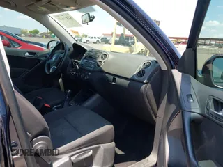 2013 Volkswagen Tiguan with VIN WVGCV3AX6DW605876, listed as a IAAI auction lot 42431619 with 106,279 mi miles and . Bid and sale history available at DreamBid. Image 5.