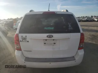 2011 Kia Sedona LX with VIN KNDMG4C74B6370803, listed as a Copart auction lot 77228344 with 142,394 mi miles and Salvage Title. Bid and sale history available at carsss.com. Image 6.