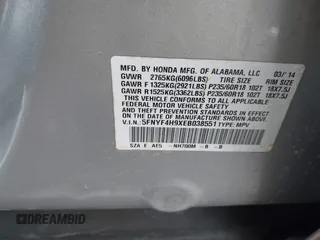 2014 Honda Pilot Touring with VIN 5FNYF4H9XEB038551, listed as a IAAI auction lot 41585720 with 150,725 mi miles and . Bid and sale history available at carsss.com. Image 9.
