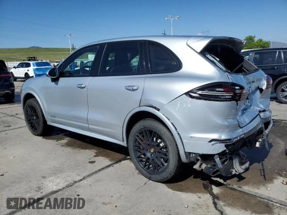 2016 Porsche Cayenne GTS with VIN WP1AD2A25GLA78110, listed as a Copart auction lot 55126705 with 118,855 mi miles and Salvage title. Bid and sale history available at DreamBid. Image 2.