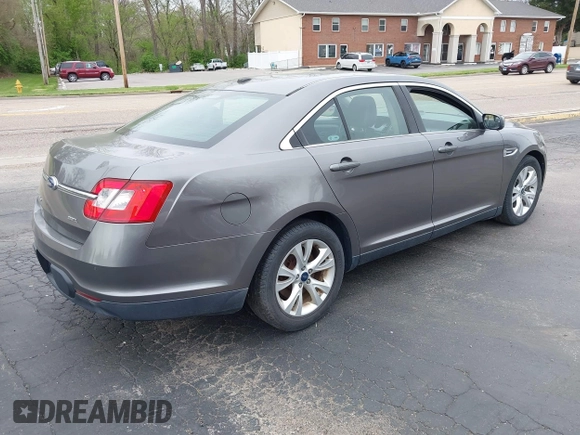 2012 Ford Taurus SEL with VIN 1FAHP2EW4CG107920, listed as a IAAI auction lot 42044023 with 107,696 mi miles and . Bid and sale history available at DreamBid. Image 4.