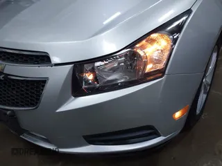 2014 Chevrolet Cruze 2LT z VIN 1G1PE5SB4E7393620, wystawiony jako IAAI lot #42056437 z przebiegiem 173 687 mil mil oraz . Historia ofert i sprzedaży dostępna na DreamBid. Obrazek 18.