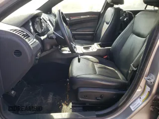 2014 Chrysler 300 C with VIN 2C3CCAKG3EH157999, listed as a Copart auction lot 74798564 with 136,277 mi miles and Salvage Title. Bid and sale history available at carsss.com. Image 7.