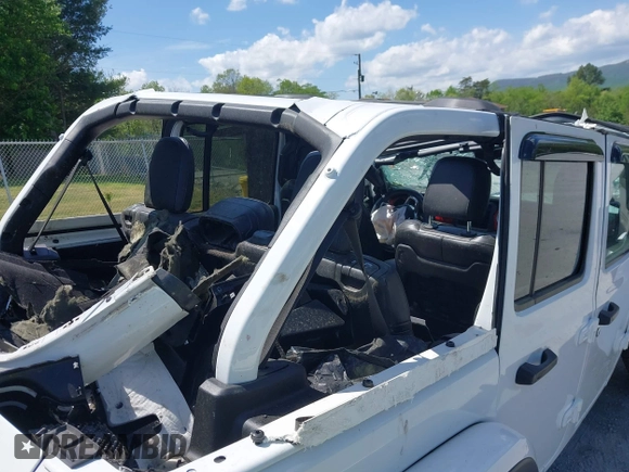 2020 Jeep Wrangler Unlimited Rubicon z VIN 1C4JJXFM5LW278740, wystawiony jako IAAI lot #42086112 z przebiegiem 93 658 mil mil oraz . Historia ofert i sprzedaży dostępna na DreamBid. Obrazek 14.