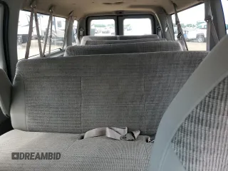 2000 Ford Econoline Passenger XL with VIN 1FBSS31L5YHA98957, listed as a Copart auction lot 56466624 with 102,350 mi miles and Salvage Title. Bid and sale history available at DreamBid. Image 10.