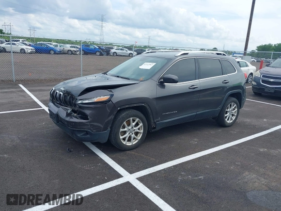 2015 Jeep Cherokee Latitude with VIN 1C4PJLCB5FW689811, listed as a IAAI auction lot 42113567 with 113,740 mi miles and . Bid and sale history available at carsss.com. Image 2.