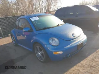 2004 Volkswagen New Beetle Coupe Satellite Blue with VIN 3VWGK31C84M420043, listed as a IAAI auction lot 41871049 with 251,646 mi miles. Bid and sale history available at carsss.com. Image 1.