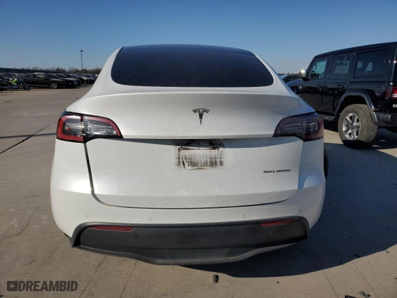 2022 Tesla Model Y Long Range with VIN 7SAYGDEE6NA015671, listed as a Copart auction lot 42236635 with 68,540 mi miles and Salvage Title. Bid and sale history available at carsss.com. Image 6.