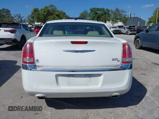 2014 Chrysler 300 with VIN 2C3CCAET6EH173381, listed as a IAAI auction lot 42158270 with 124,551 mi miles. Bid and sale history available at carsss.com. Image 16.
