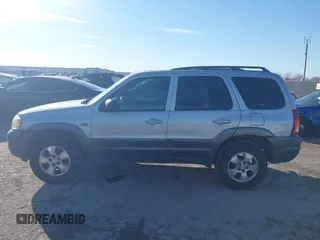 2003 Mazda Tribute LX with VIN 4F2YZ04183KM44733, listed as a IAAI auction lot 41472662 with 246,522 mi miles and . Bid and sale history available at DreamBid. Image 14.