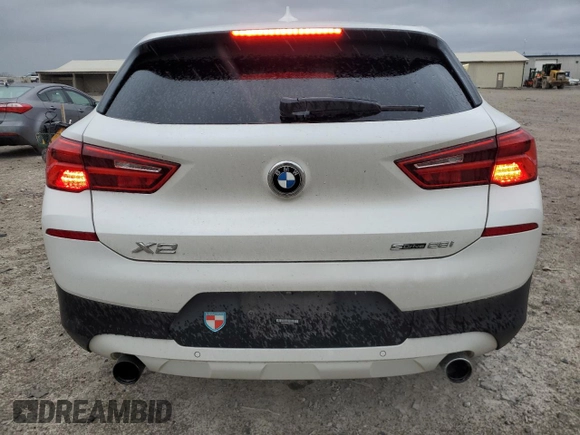 2019 BMW X2 sDrive28i with VIN WBXYJ3C58K5N39693, listed as a Copart auction lot 86760414 with 77,668 mi miles and Salvage Title. Bid and sale history available at carsss.com. Image 6.
