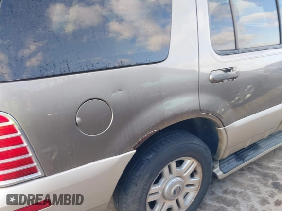 2005 Mercury Mountaineer Convenience z VIN 4M2ZU86W85ZJ07395, wystawiony jako IAAI lot #41767380 z przebiegiem 276 551 mil mil oraz . Historia ofert i sprzedaży dostępna na DreamBid. Obrazek 13.