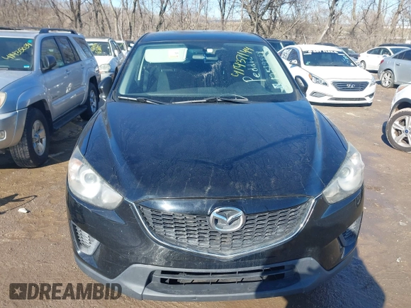2014 Mazda CX-5 Sport with VIN JM3KE2BE7E0313978, listed as a IAAI auction lot 41437144 with 161,181 mi miles and . Bid and sale history available at carsss.com. Image 6.