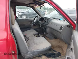 1999 Nissan Frontier XE with VIN 1N6DD21S8XC324434, listed as a IAAI auction lot 42580242 with 322,016 mi miles and . Bid and sale history available at DreamBid. Image 5.