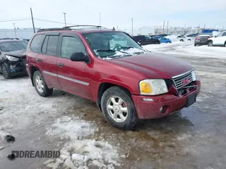 2008 GMC Envoy SLE2 with VIN 1GKDT13S182132619, listed as a IAAI auction lot 41605231 with 138,458 mi miles. Bid and sale history available at carsss.com. Image 1.