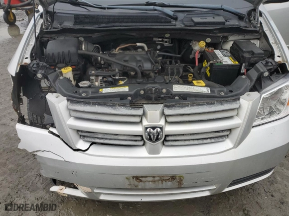 2009 Dodge Grand Caravan SE with VIN 2D8HN44EX9R666305, listed as a Copart auction lot 86133974 with 152,400 mi miles and Salvage Title. Bid and sale history available at carsss.com. Image 12.