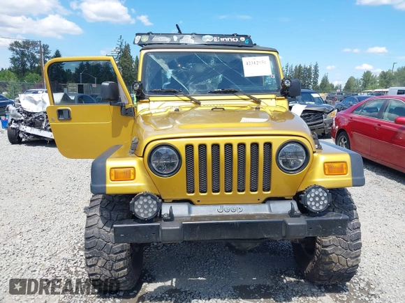 2003 Jeep Wrangler Rubicon with VIN 1J4FA69S93P302102, listed as a IAAI auction lot 42312951 with 146,408 mi miles and . Bid and sale history available at DreamBid. Image 12.