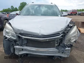 2016 Chevrolet Equinox LT z VIN 2GNALCEK6G1141457, wystawiony jako IAAI lot #42253853 z przebiegiem 110 203 mil mil oraz . Historia ofert i sprzedaży dostępna na DreamBid. Obrazek 6.