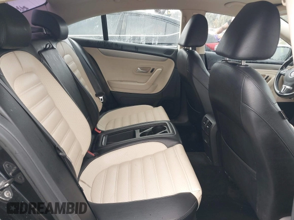 2012 Volkswagen CC R-Line z VIN WVWMP7AN5CE501909, wystawiony jako IAAI lot #39791104 z przebiegiem 217 399 mil mil oraz . Historia ofert i sprzedaży dostępna na DreamBid. Obrazek 8.