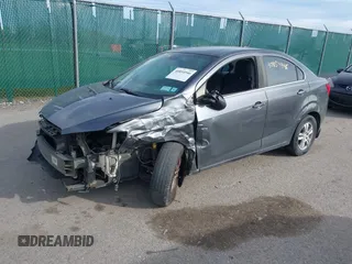 2012 Chevrolet Sonic LT with VIN 1G1JC5SH5C4167049, listed as a IAAI auction lot 42124461 with 134,864 mi miles and . Bid and sale history available at DreamBid. Image 2.