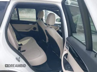 2021 BMW X1 xDrive28i with VIN WBXJG9C07M5U21337, listed as a IAAI auction lot 42590859 with 35,934 mi miles and . Bid and sale history available at DreamBid. Image 8.