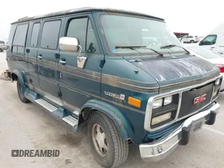 1994 GMC Vandura z VIN 1GDEG25K2RF523677, wystawiony jako IAAI lot #42500077 z przebiegiem 184 965 mil mil oraz . Historia ofert i sprzedaży dostępna na DreamBid. Obrazek 6.