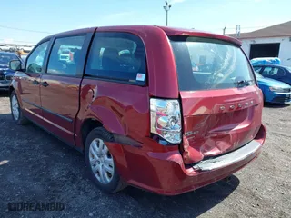 2014 Dodge Grand Caravan SE with VIN 2C4RDGBG8ER130488, listed as a IAAI auction lot 41974981 with 126,315 mi miles. Bid and sale history available at carsss.com. Image 3.