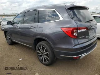 2022 Honda Pilot Touring 7-Passenger with VIN 5FNYF6H6XNB014347, listed as a Copart auction lot 56869745 with 31,513 mi miles and Salvage title. Bid and sale history available at DreamBid. Image 2.